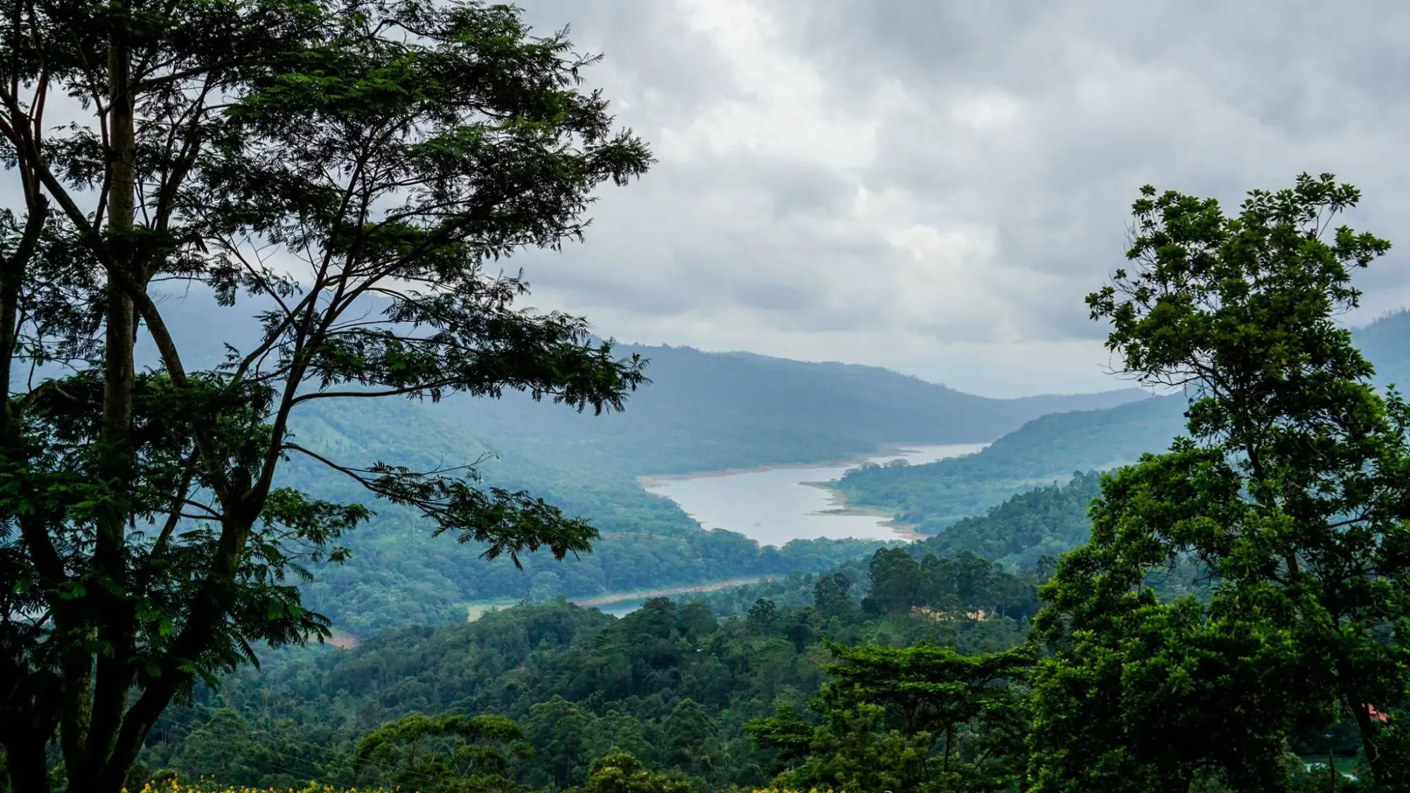 Shree Bhakta Hanuman Kovil:The Mahaweli River carving a silent path through the deep greens of the Kotmale Valle
