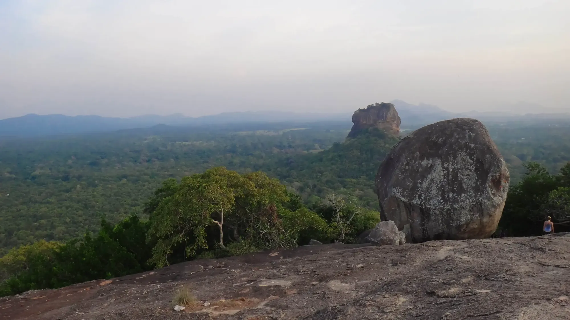 Looking West from the top—watching the sun hit the golden face of the Lion Rock